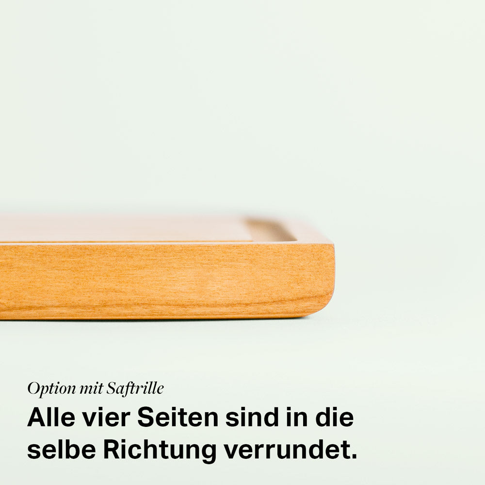 großes schneidebrett aus Kirschenholz mit verrundeter Kante