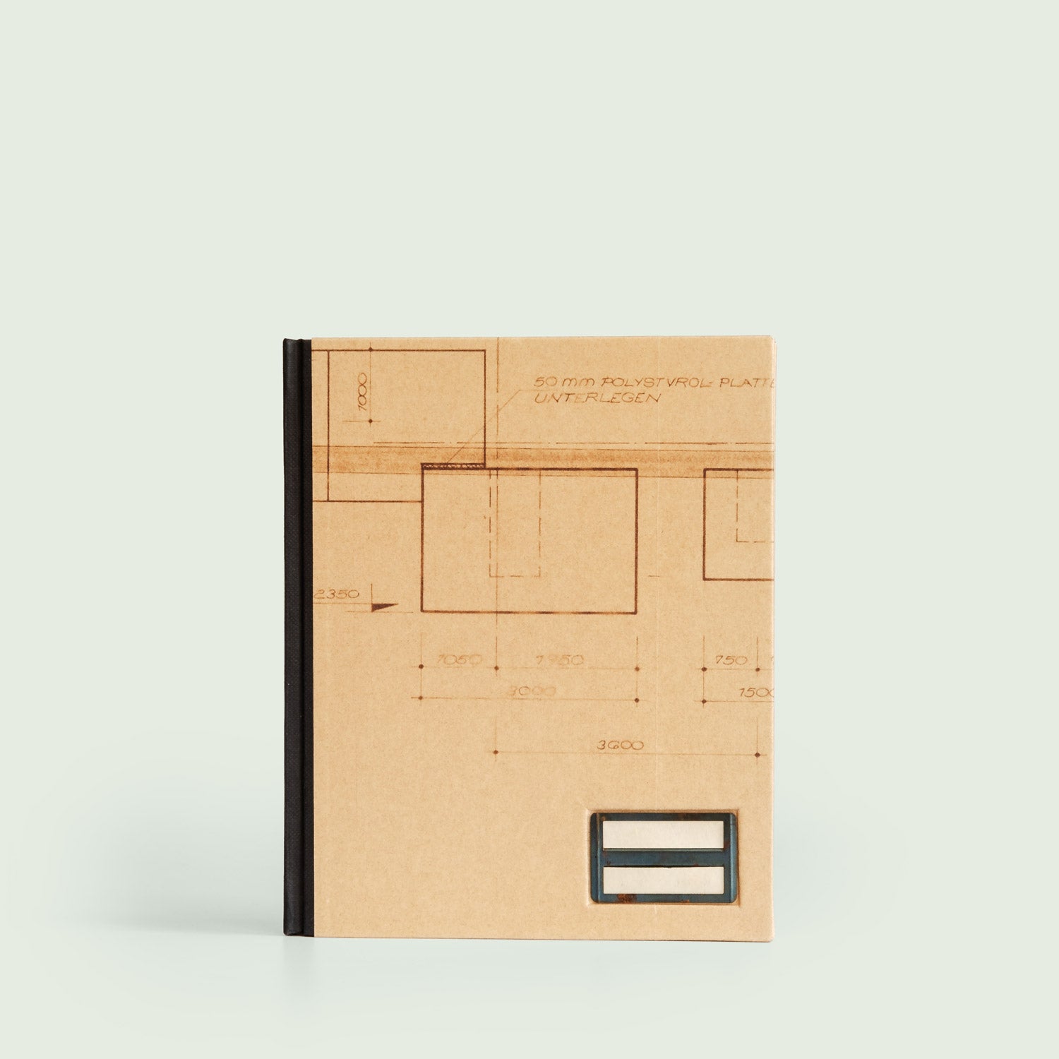 Frontalansicht eines Notizbuchs mit technischem Zeichnungsdesign auf dem Einband.